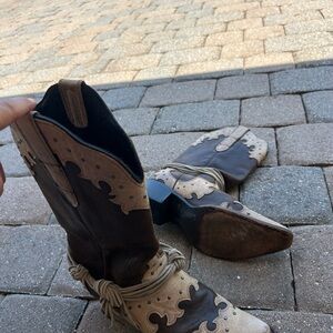 Very cute country leather boots. Rarely worn. Brown/tans w/studs and fringes.